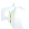 eternal-radiant-21k-gold-hanging-earrings