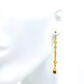 vibrant-charming-21k-gold-hanging-earrings