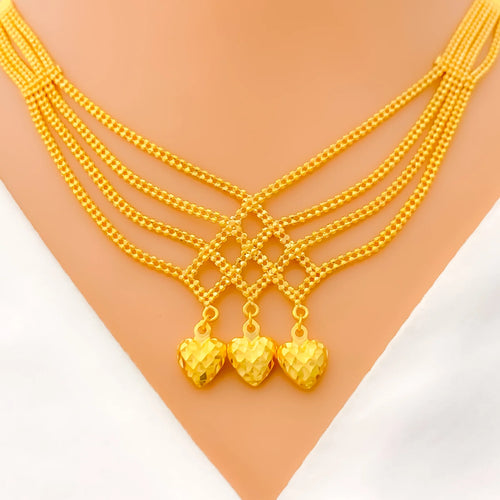 dazzling-heart-accented-22k-gold-set