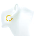 radiant-jazzy-21k-gold-hoop-earrings