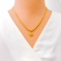 Glistening Striped 22k Gold OM Pendant 