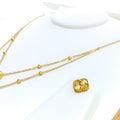 Elegant Dual Layered 21k Gold Clover Necklace Set