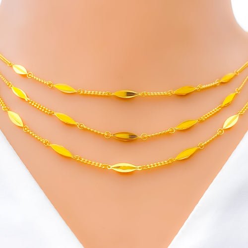 Chic Leaf Adorned Three Lara 22K Gold Necklace Set