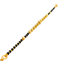 graceful-jazzy-22k-gold-black-bead-bracelet