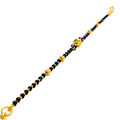 tasteful-fine-22k-gold-black-bead-bracelet