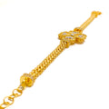 bold-flower-21k-gold-cz-bracelet