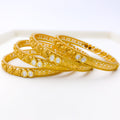 Magnificent Kundan Leaf Set of 4 22k Gold Bangles