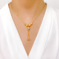 Criss Cross Triple Tassel Necklace