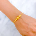 22k-gold-Special Stately Triple Orb Bangle Bracelet