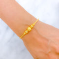 22k-gold-Shiny Dotted Sand Finish Bangle Bracelet