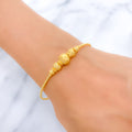 22k-gold-Shiny Dotted Sand Finish Bangle Bracelet