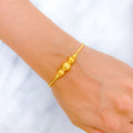 22k-gold-Upscale Shimmery Orb Bangle Bracelet