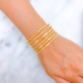 22k-gold-Trendy Sparkling Cutwork Bangles