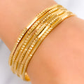 22k-gold-Trendy Sparkling Cutwork Bangles