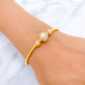 22k-gold-Bold Stately Striped Orb Bangle Bracelet