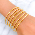 22k-gold-Smooth Textured Dotted Bangles