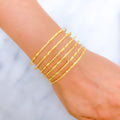 22k-gold-Extravagant Alternating Leaf Bangles