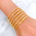 22k-gold-Extravagant Alternating Leaf Bangles