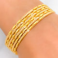 22k-gold-Extravagant Alternating Leaf Bangles