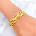 22k-gold-Extravagant Alternating Leaf Bangles