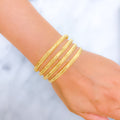 22k-gold-Ritzy Striped Shimmering Bangles