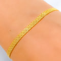 22k-gold-Modest Dual Tone Flat Bracelet