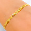 22k-gold-Modest Dual Tone Flat Bracelet