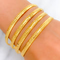 22k-gold-Ritzy Striped Shimmering Bangles