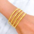 22k-gold-Ritzy Striped Shimmering Bangles