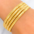 22k-gold-Ritzy Striped Shimmering Bangles