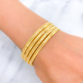 22k-gold-Ritzy Striped Shimmering Bangles