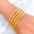 22k-gold-Reflective Wavy Textured Bangles