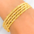 22k-gold-Reflective Wavy Textured Bangles