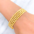 22k-gold-Reflective Wavy Textured Bangles