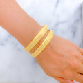 22k-gold-Luscious Reflective Flower Bangles