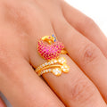 Glistening Peacock in Red CZ Ring