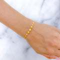 Refined Two-Tone 22k Gold Bracelet