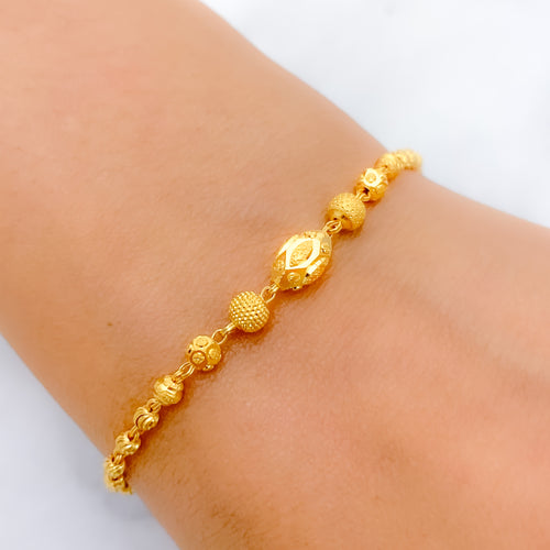 Reflective Oval 22k Gold Bead Bracelet