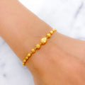 Reflective Oval 22k Gold Bead Bracelet