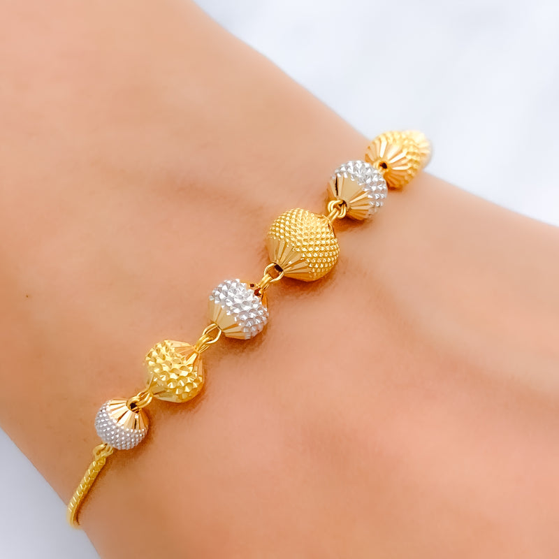 Fancy Striking Round 22k Gold Bracelet