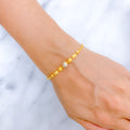 Charming Chic Two-Tone 22k Gold Bracelet