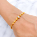 Charming Chic Two-Tone 22k Gold Bracelet