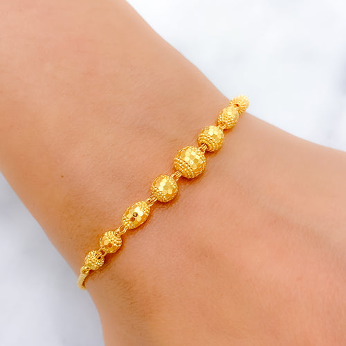 Fancy Orb 22k Gold Bracelet