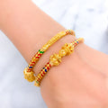 22k-gold-flower-adorned-vibrant-pipe-bangles