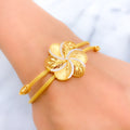 22k-gold-alternating-dual-finish-flower-cz-bracelet