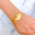 22k-gold-dual-finish-intricate-leaf-cz-bracelet