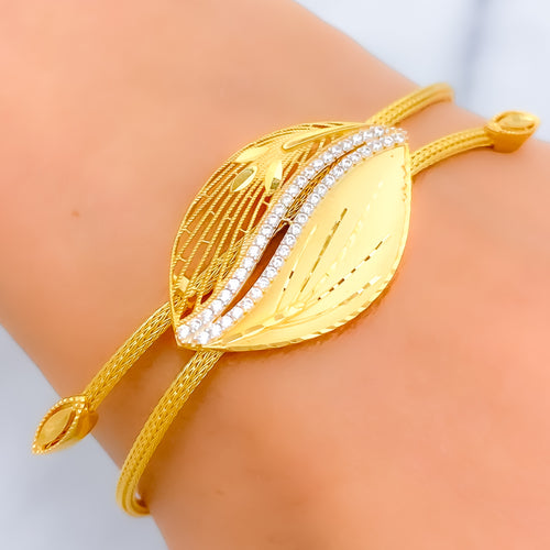 22k-gold-dual-finish-intricate-leaf-cz-bracelet
