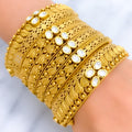 Impressive Set of 2 Kundan Leaf 22k Gold Bangles