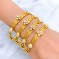 Noble Floral CZ Meenakari 22k Gold Set Of 4 Bangles