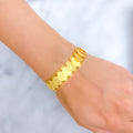 22k-gold-shimmering-flower-coin-bracelet